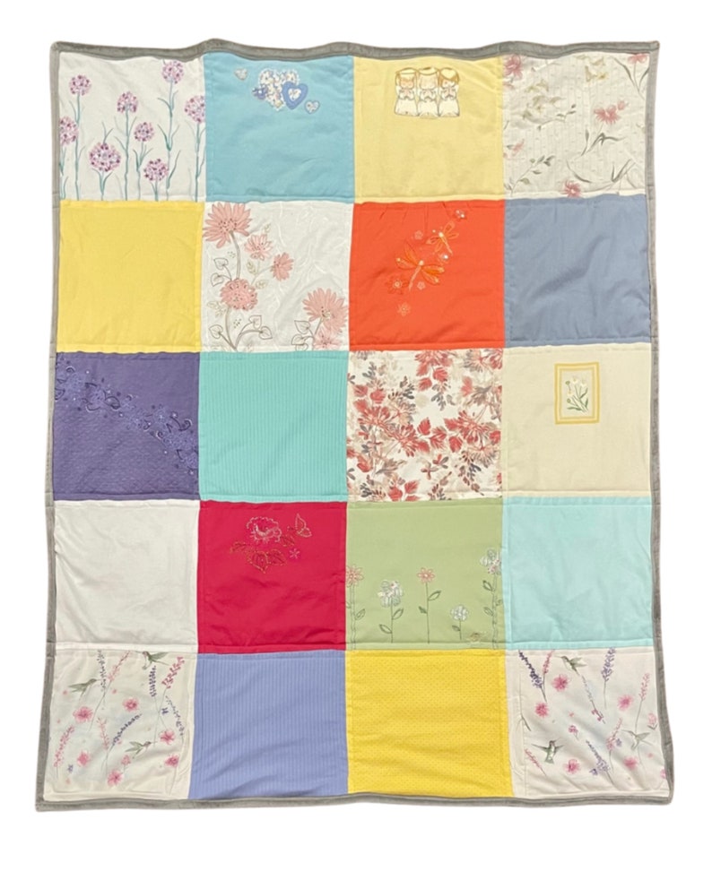 Handmade T-shirt quilt, cozy throw blanket, featuring colorful fabric patches from favorite tees. Perfect for dorm decor, unique gifts, and upcycled home decor. Ideal for college students, T-shirt lovers, or as a warm, soft, machine washable keepsake