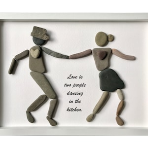 Stone picture dancing couple heart stones love partnership relationship stone art stone picture