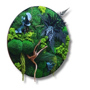 Moss art in a modern metal frame. Stabilized plants create a calming and stylish decoration for bathrooms, spas, or yoga rooms. A green masterpiece for living rooms or moss walls. Metal wall art that blends nature with contemporary design.