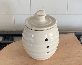 Ceramic garlic keeper, garlic jar, storage for a giant garlic clove, holes to control the humidity inside the jar, creamy white H 4" W 3.5 "