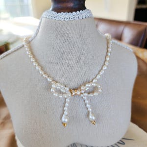 Freshwater pearl bow necklace, Bridal pearl necklace with bow pendant, Wedding jewelry, Romantic pearl necklace with bow accent