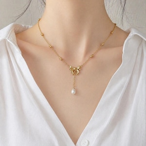 Bow Pendant Necklace: Vintage Style with Pearl Drop (Gold Plated)