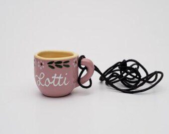 Pink shot glass and shot glass with personalized name, approx. 2 cl. Includes leather strap.