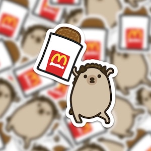 May include: A brown hedgehog holding a white bag with a red McDonald's logo and a hamburger inside. The hedgehog is smiling and has a happy expression.