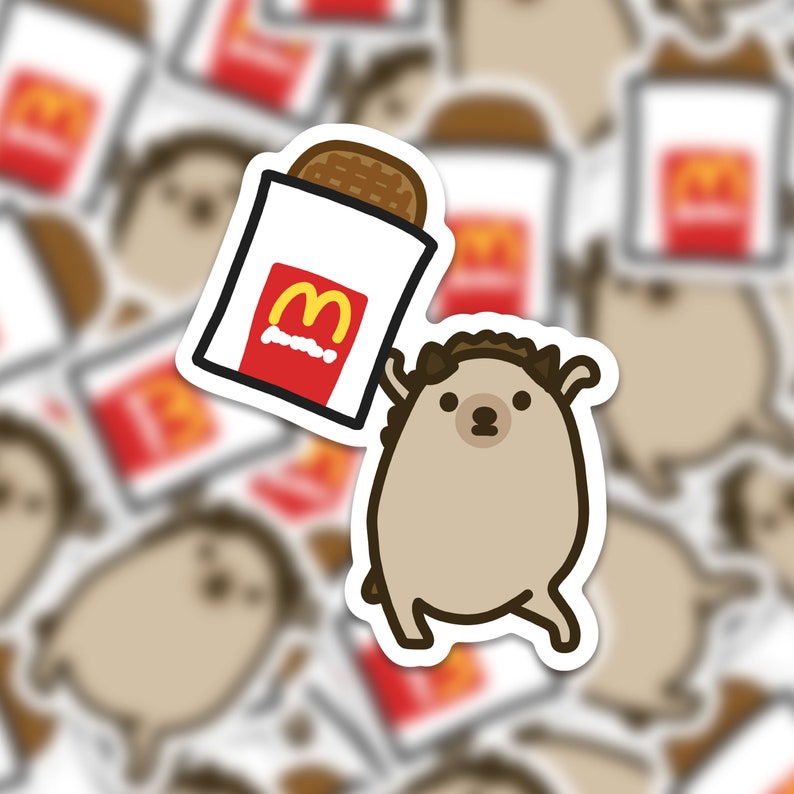May include: A brown hedgehog holding a white bag with a red McDonald's logo and a hamburger inside. The hedgehog is smiling and has a happy expression.