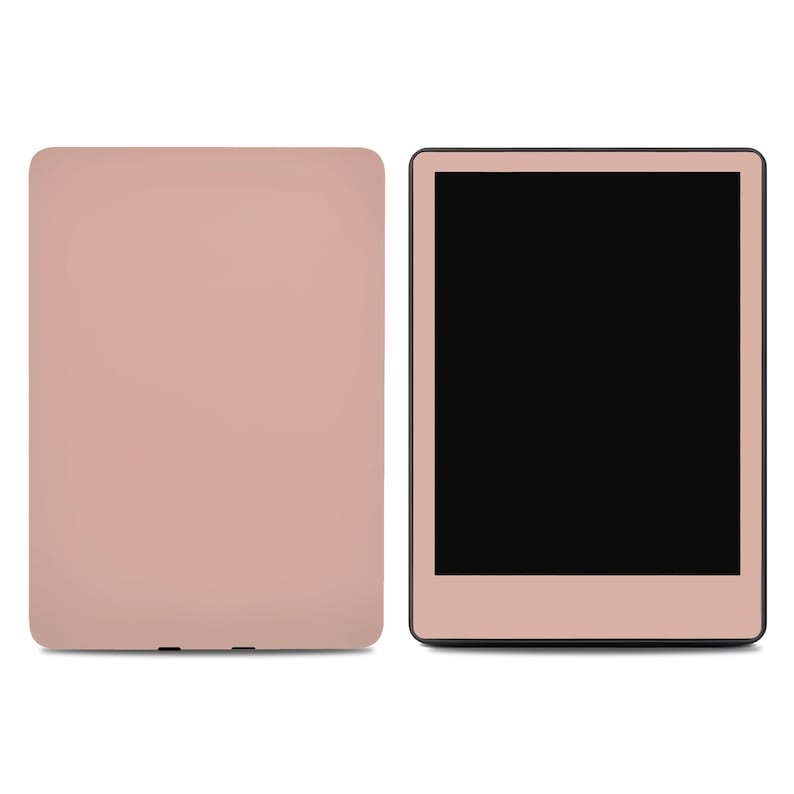 May include: A rose gold e-reader with a black screen and a rose gold case. The e-reader is turned off and the screen is blank.