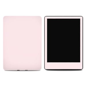 May include: A light pink tablet and a matching tablet case. The tablet has a black screen and a white border. The case is a solid light pink color. The tablet and case are side by side on a white background.