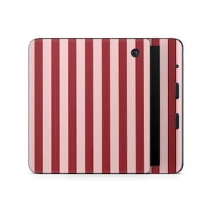 May include: A tablet case with a vertical striped pattern in alternating shades of red and light pink. The case has a black camera lens and a black vertical stripe on the side with buttons.