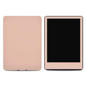 May include: A rose gold e-reader with a black screen and a matching rose gold cover.