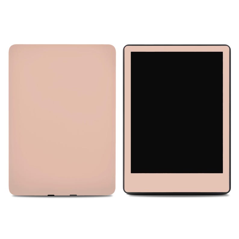 May include: A rose gold e-reader with a black screen and a matching rose gold cover.