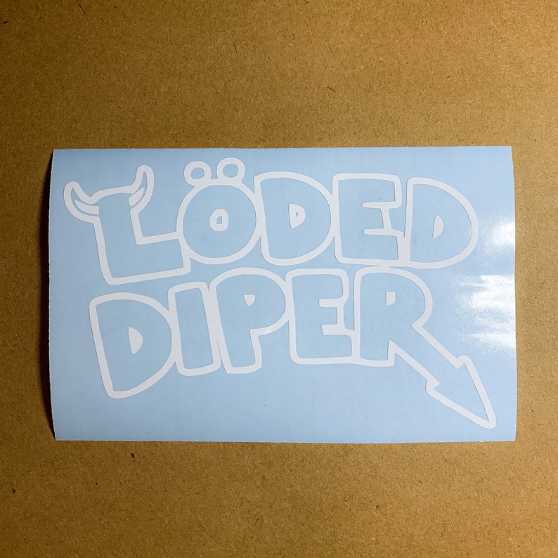 May include: A light blue sticker with white lettering that reads "L&Ouml;DED DIPER" with a small white cartoon bull's head to the left of the text.