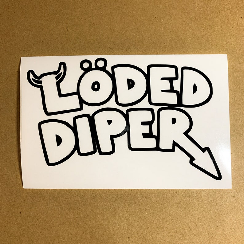 May include: Black and white sticker with the text "L&Ouml;DED DIPER" in a cartoon font.