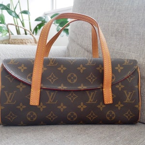 LOUIS VUITTON REPORTER PM CANVAS MONOGRAM LV BANDOULIERE HANDBAG Brown  Cloth ref.663492 - Joli Closet