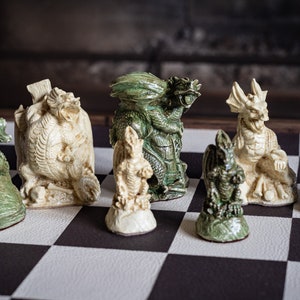 Made To Order – Chess set, Dragons design in a Jade and Stone effect. BOARD NOT INCULDED