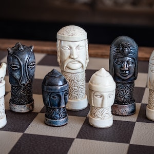 Made to order – Chess set, Celtic design in an aged stone and blue colour. BOARD NOT INCULDED