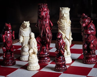 Made to Order – Chess set, Reynard the Fox design in a stone and aged red colour. BOARD NOT INCULDED