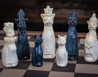 Made to order – Chess set, Royal Cats design in a stone and aged blue colour. BOARD NOT INCULDED