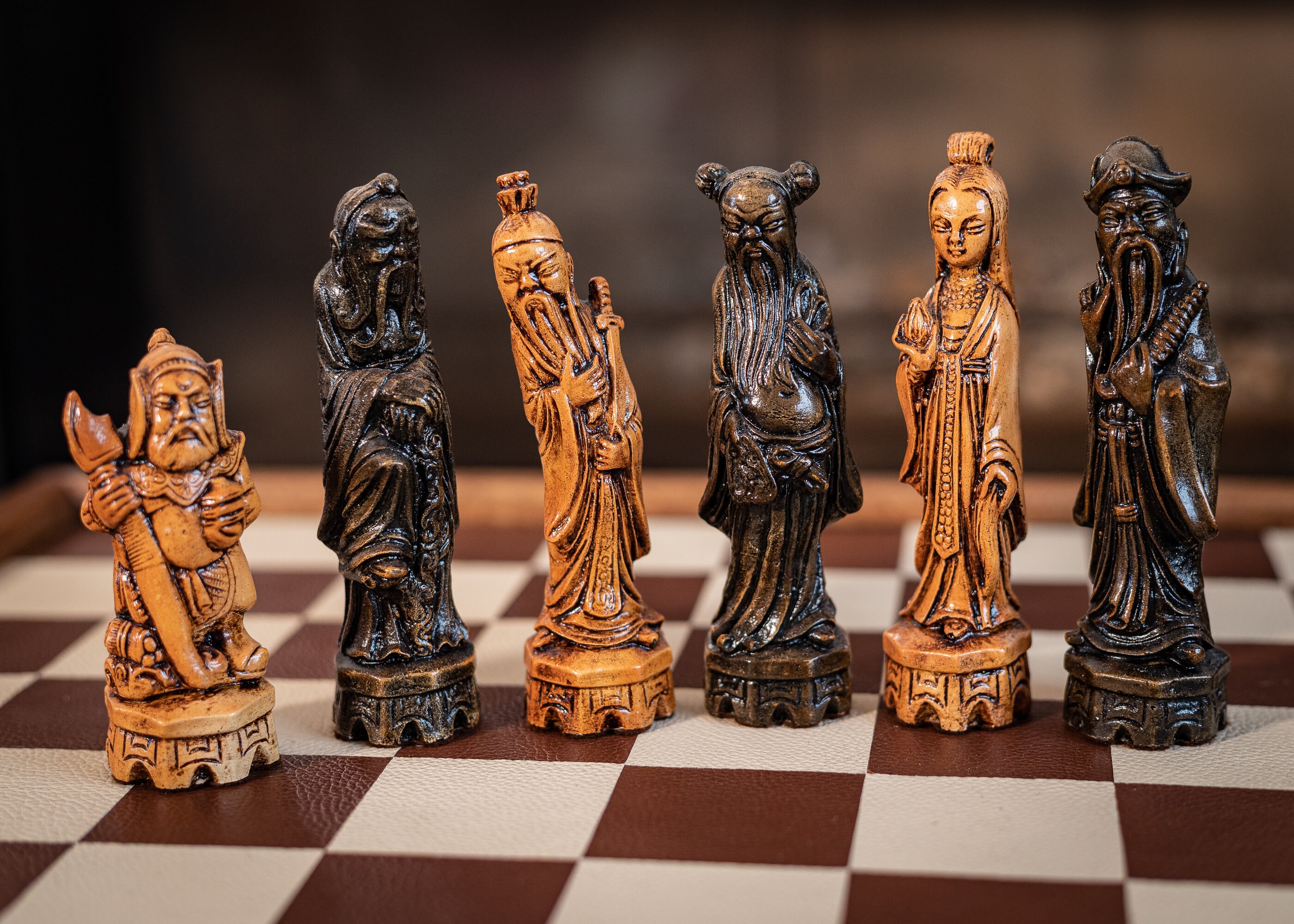 At Auction: A large ornate chess set with sterling silver board. Board  measures 46x46x8cm