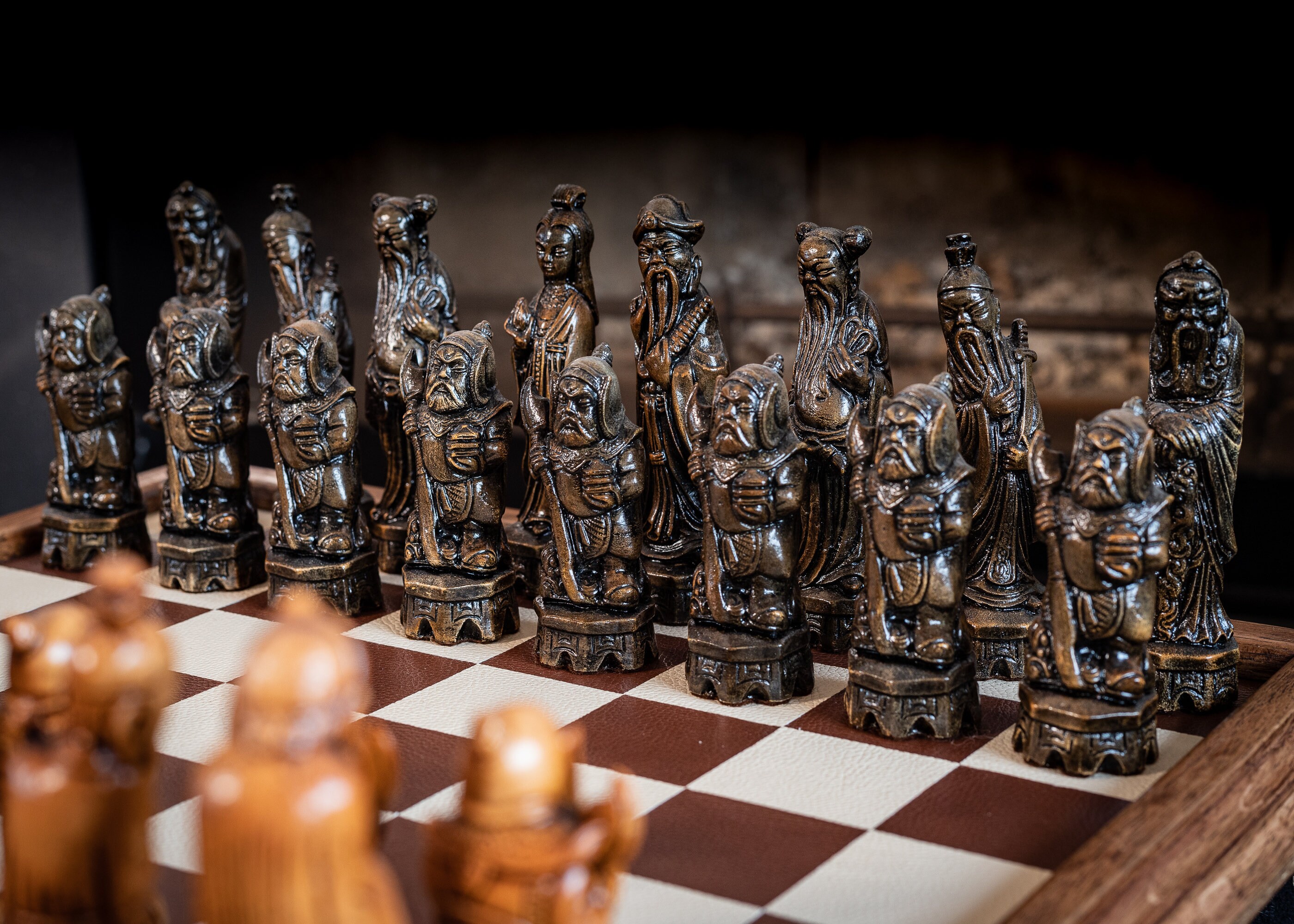 At Auction: A large ornate chess set with sterling silver board. Board  measures 46x46x8cm