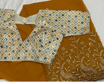 Gold embroidery Georgette saree with blouse
