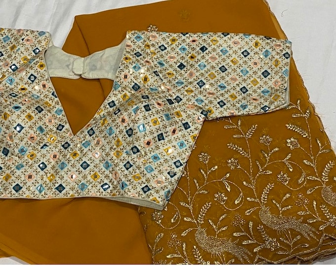 Gold embroidery Georgette saree with blouse