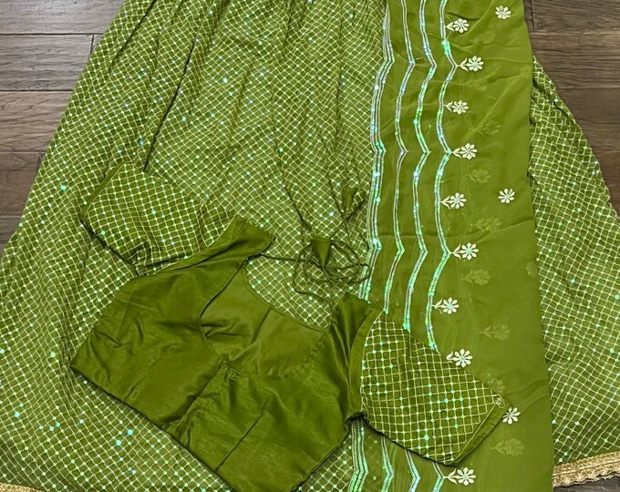 Gorgeous Mehendi Green Sequence Embroidery Georgette Lehenga And Blouse size 32-42 inches.