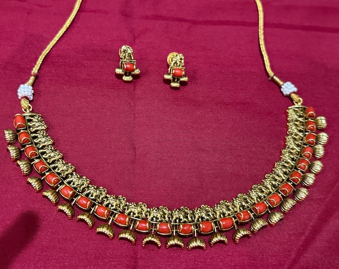 Elegant Gold Replica Necklace Set with CZ  and Coral Stones with earrings