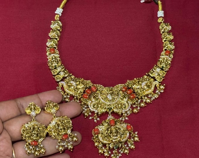 Elegant Gold Replica Necklace Set with CZ  and Coral Stones with earrings
