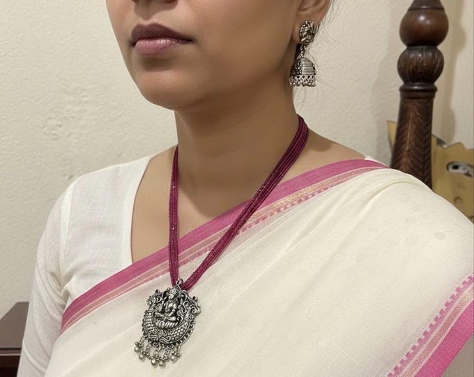 German Silver Lakshmi Pendant Necklace with Pink Beaded Earrings