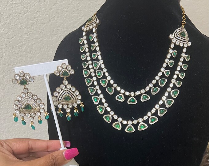 Beautiful green layered  bikanary  kundan grand looking mala  with earrings and tikka