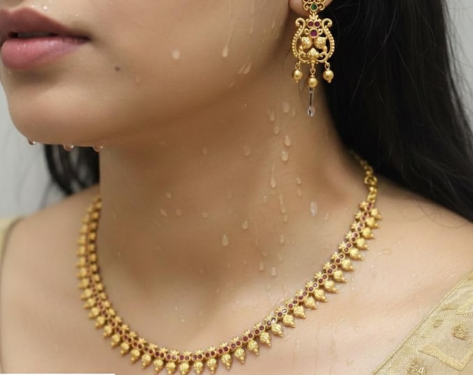 Elegant Gold Replica Necklace Set with Emerald  and ruby Stones with earrings