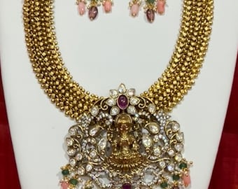 Laksmi Crafted Necklace with Earrings: Grand Gold Tone Jewelry