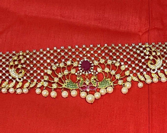 Exquisite waistband is meticulously crafted with shimmering CZ stones