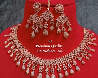Elegant Diamond-Cut Tear Drop Rosegold CZ Necklace Set with Green Stone and matching Earrings, Tikka / Diamond Replica