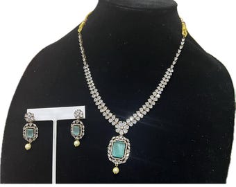 Elegant Diamond-Cut Necklace Set with Blue Stone and Pearl Accents