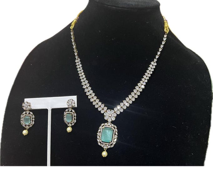 Elegant Diamond-Cut Necklace Set with Blue Stone and Pearl Accents