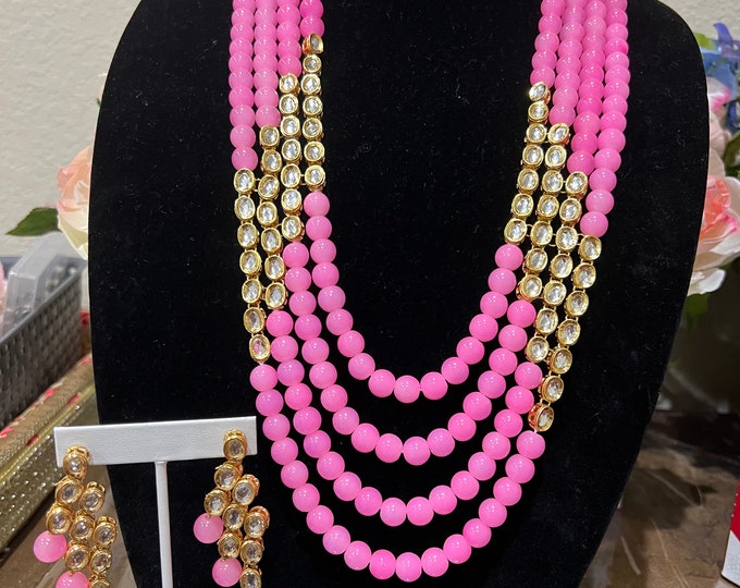 Beautiful pink layered  kundan grand looking mala  with earrings.