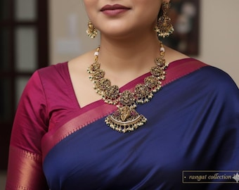 Radiant Gold-Plated Dasavatharam Necklace with Green, Ruby and White Stones, and Matching Earrings