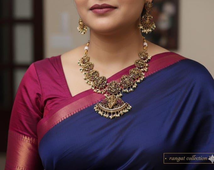Radiant Gold-Plated Dasavatharam Necklace with Green, Ruby and White Stones, and Matching Earrings