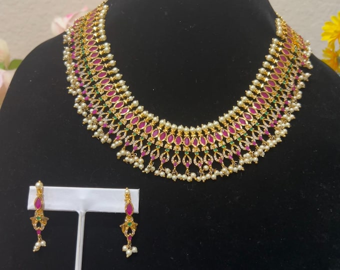 Radiant Gold-Plated Necklace with Ruby, Green, Pearl drops and White CZ Stones, and Matching Earrings