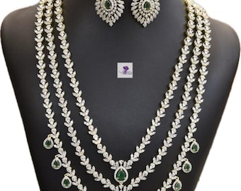 Elegant Diamond-Cut Layered CZ Necklace Set with Green Stone and matching Earrings
