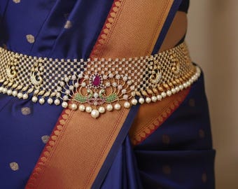 Exquisite waistband is meticulously crafted with shimmering CZ stones