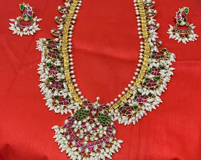 Beautiful heavy grand looking Jadau long mango mala with pearl paired with jadau earrings