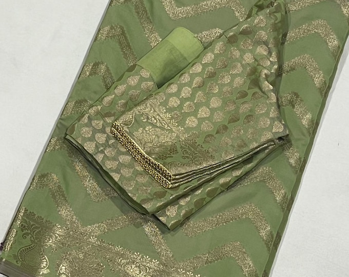 Beautiful Apple Green Benarasi Border Silk saree with stitched blouse fits 34-42 size back open.