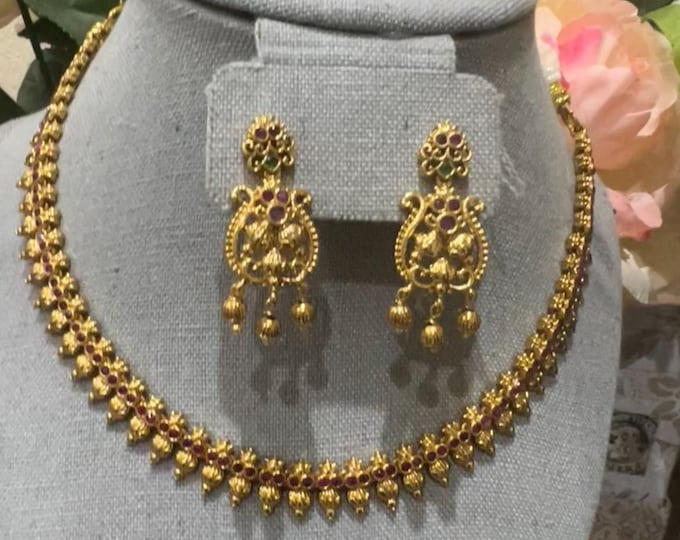 Elegant Gold Replica Necklace Set with Emerald  and ruby Stones with earrings