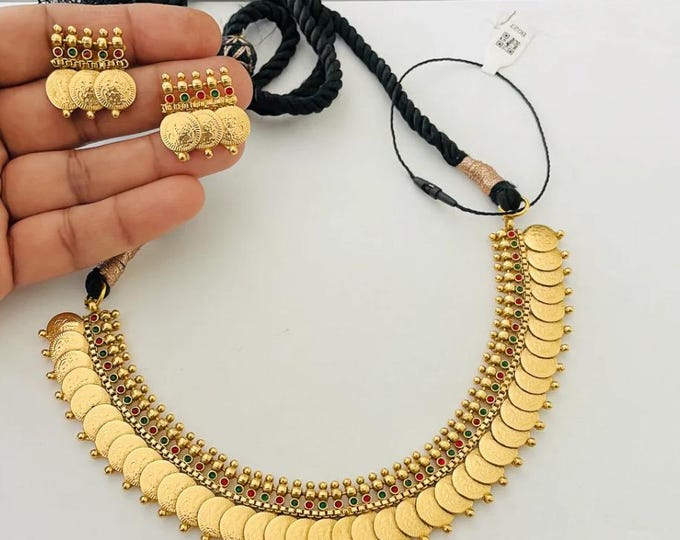 Elegant Gold Replica Kakmi Kasu Necklace Set with Emerald and ruby Stones with earrings