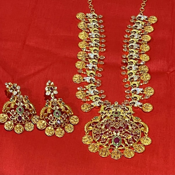 Gorgeous Ram Parivar Necklace with CZ and Ruby  stones paired with earrings