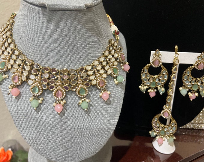 Beautiful heavy grand looking  beads kundan necklace with earrings and mong tikka