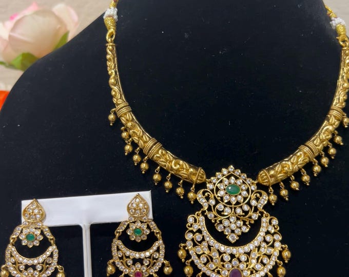 Radiant Gold-Plated Necklace with Ruby, Green and White CZ Stones, and Matching Earrings