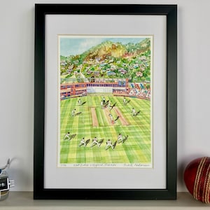 West Indies win the 2022 Test Series in glorious Grenada. Alzarri Joseph bowls to Ben Stokes. Print. Unframed
